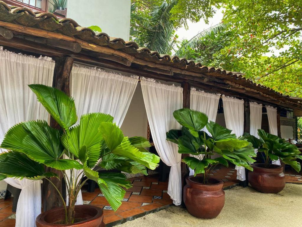 Macao Beach Sámara Extérieur photo