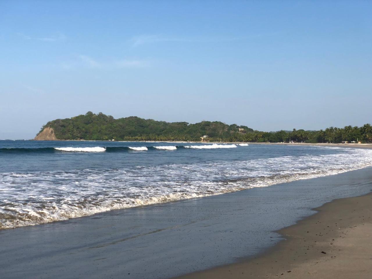 Macao Beach Sámara Extérieur photo